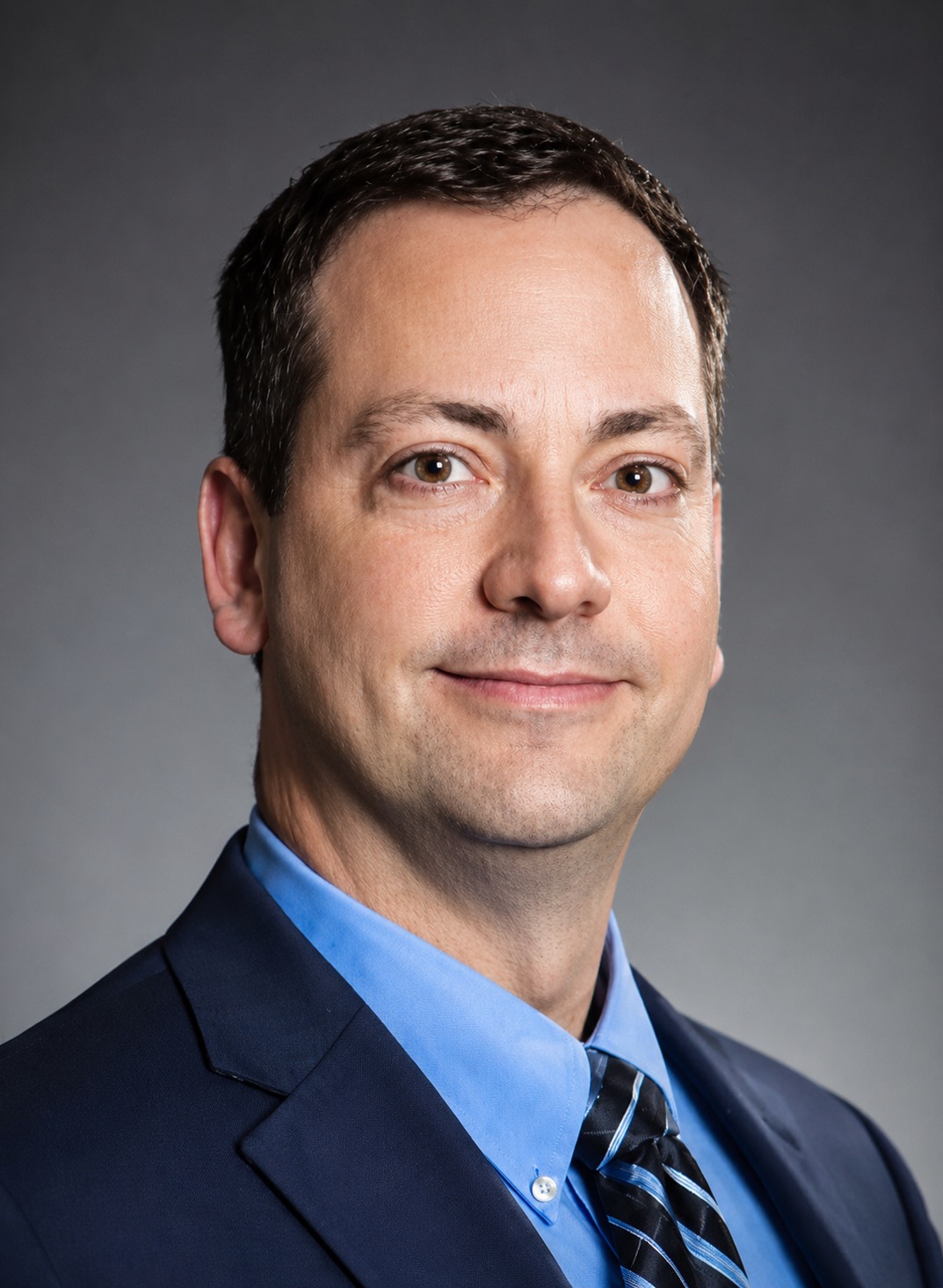 Dr. Adam Miller